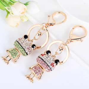 Sparkly crystal frog keychains with green and pink rhinestones on gold alloy base