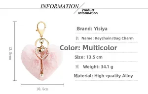 Detailed view of pink plush heart keychain with pearl accents and 13.5cm size dimensions
