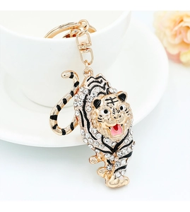 Detailed close-up of a sparkling crystal zodiac tiger keychain with gold plating