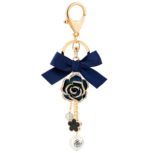Blue enamel camellia keychain with silk bow and pearl pendant on gold link chain