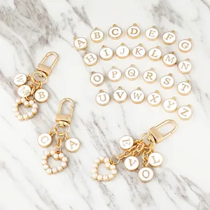 DIY Alphabet Initial Keychain Artificial Pearl Heart Pendant Bag Charm Zinc Alloy Gold Plated Enamel Alphabet Round Tag Bag Accessory