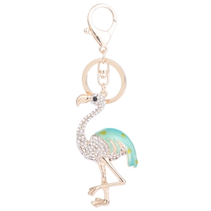 Porte-clés flamant rose doré avec cristaux brillants et finition en émail vert clair
