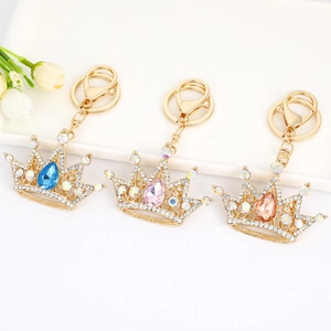 Elegant crystal crown keychains with teardrop rhinestones in blue, pink, and amber gold