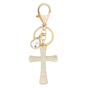 Golden cross keychain with sparkling crystals and pear-shaped drop charm on white background