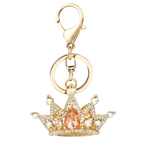 Golden crown keychain featuring sparkling crystals and an amber gemstone drop