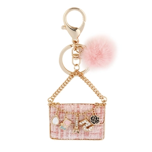 Pink tweed bag keychain with mink fur pompom and golden Eiffel Tower charms