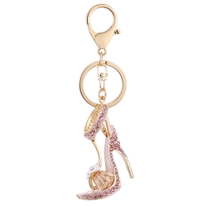 Rosa Strass-High-Heel-Schlüsselanhänger mit weißer Blume und goldenem Karabiner