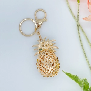Creative gold pineapple keychain with sparkling crystals and a large lobster clasp decoration
