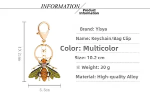 Macro detail of alloy bee keychain with dimensions showing the 10.2cm length
