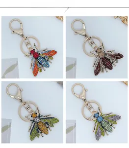 Detailed color display of creative alloy bee keychains with sparkling rhinestones
