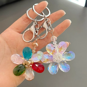Minimalist crystal flower keychain with colorful petals and silver lobster clasp
