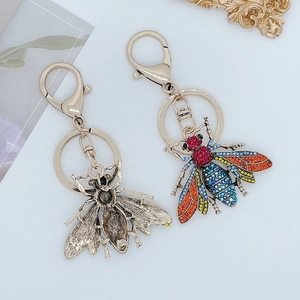 Creative rhinestone bee keychain with antique gold finish and colorful crystals for bags