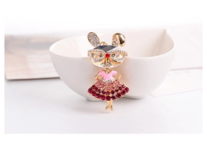 Detail of pink crystal encrusted rabbit girl pendant with gradient rhinestone dress