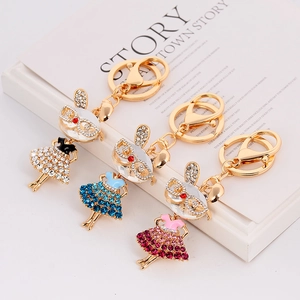 Sparkling rhinestone bunny girl car keychain charms in white, blue and rose pink colors