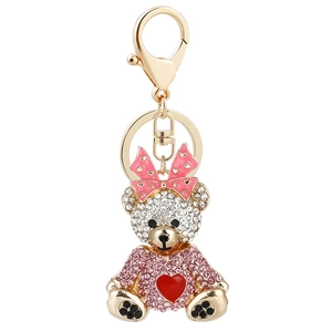 Porte-clés ours en cristal étincelant avec nœud rose et cœur rouge sur fermoir doré