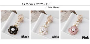 French camellia bag charms with large faux pearl centers in black, white and pink
