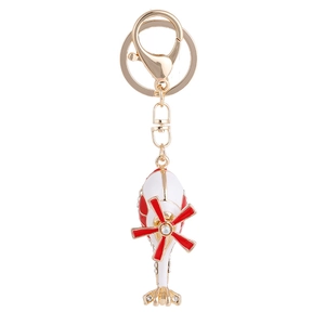 Sparkling helicopter keychain with red and white enamel in a polished gold metal finish