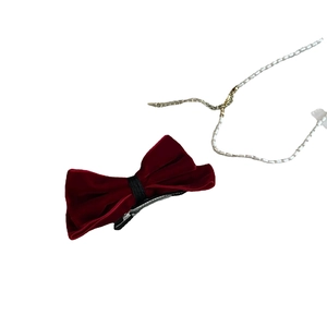 Elegant deep red velvet bow hair clip with silver metal crocodile grip for women