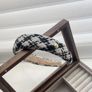 French tweed houndstooth sponge headband with elegant gold metal button detail