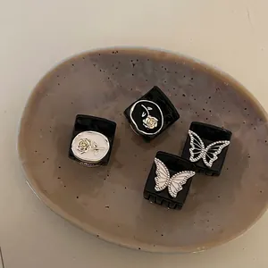 Elegant 4-piece hair clip set with vintage rose and rhinestone butterfly designs