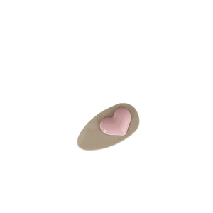 Cute cream-colored hair clip with a pink heart design for women and girls