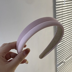 Minimalist soft pink sponge padded PU leather headband with layered design and velvet lining