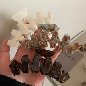 Set di tre eleganti mollette per capelli in acetato con motivi marmo e tartarugato