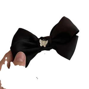 Pince à cheveux élégante en satin noir style français avec papillon en cristal doré