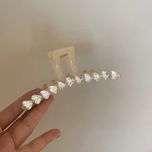 Champagne resin hair claw clip with heart-shaped rhinestones for thick hair