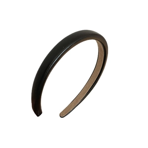Classic black leather headband for women with a minimalist non-slip lining design