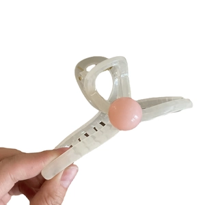 Creamy white marble hair claw clip with pink bead accent, large acrylic hair accessory