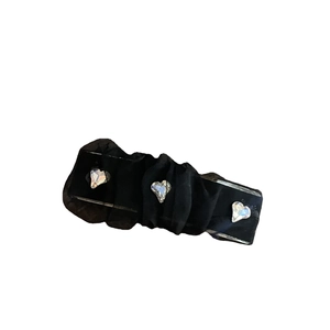 Elegant black mesh hair clip with pleated fabric and three sparkling heart rhinestones