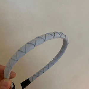 Light blue braided fabric headband with minimalist sponge design for women