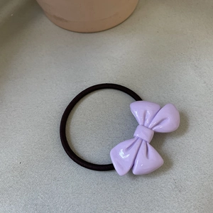 Minimalist lavender bow hair tie with high-elastic black rubber band for elegant styling