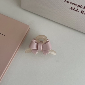 Pince à cheveux rose avec nœud pour coiffures élégantes et frange en résine douce