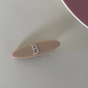 French style oval pearl hairpin with letter B design and rhinestone accent in beige