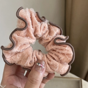 Elegant pleated mesh hair scrunchie in light pink with coffee brown wave edges