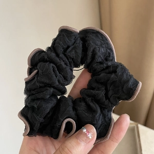 Elegant mesh scrunchie with coffee brown piping and black pleated gauze texture