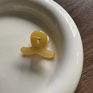 Mini amber acetate hair claw clip with France Handmade engraving on white ceramic plate