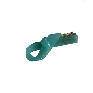 Elegant teal twist hair clip with gold metal duckbill grip and handmade engraving