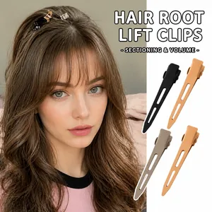Set of four matte hair root volume clips for styling in black, brown, beige, and coffee tones