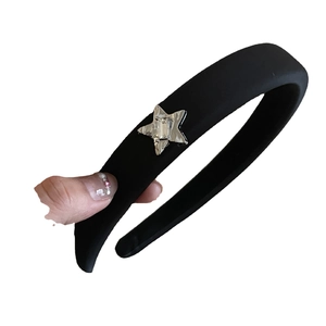 Elegant black padded sponge headband with silver star detail for high cranial top look
