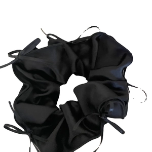 Elegant black satin oversized scrunchie with long ribbons for ballet-inspired bow styles