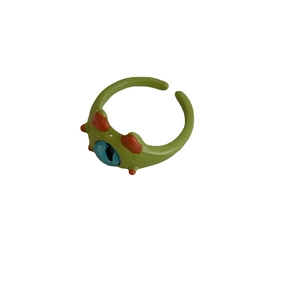 Anillo abierto de monstruo de dibujos animados verde con ojo azul grande
