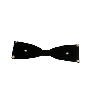 Vintage black velvet bow hair clip featuring elegant pearls with golden wavy edges