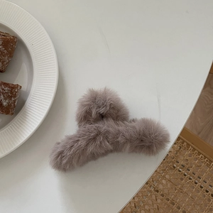 Plush faux rabbit fur hair claw clip in dusty purple for elegant autumn winter styling