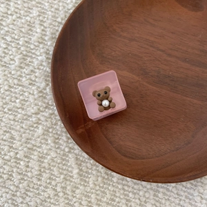 Pink acetate bear hair claw clip with brown bear and pearl accent for women