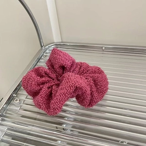 Chic rose pink chenille scrunchie with soft fluffy texture for elegant hair styling