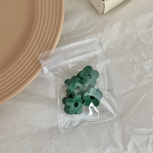 Mini caramel flower hair claw clips set in green floral shape for autumn hair styling