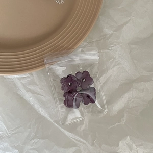 Set of 4 mini dark purple flower hair clips in resin for elegant autumn hairstyles